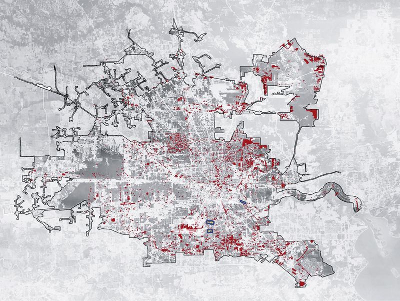 A map of Houston, Texas with vacant lots highlighted in red.