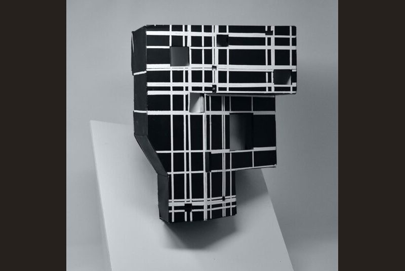 Black 3D chip board model follows an experimental concept with horizontal and vertical white stripes.