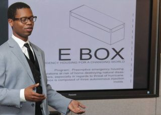 Grad student gives presentation for emergency housing