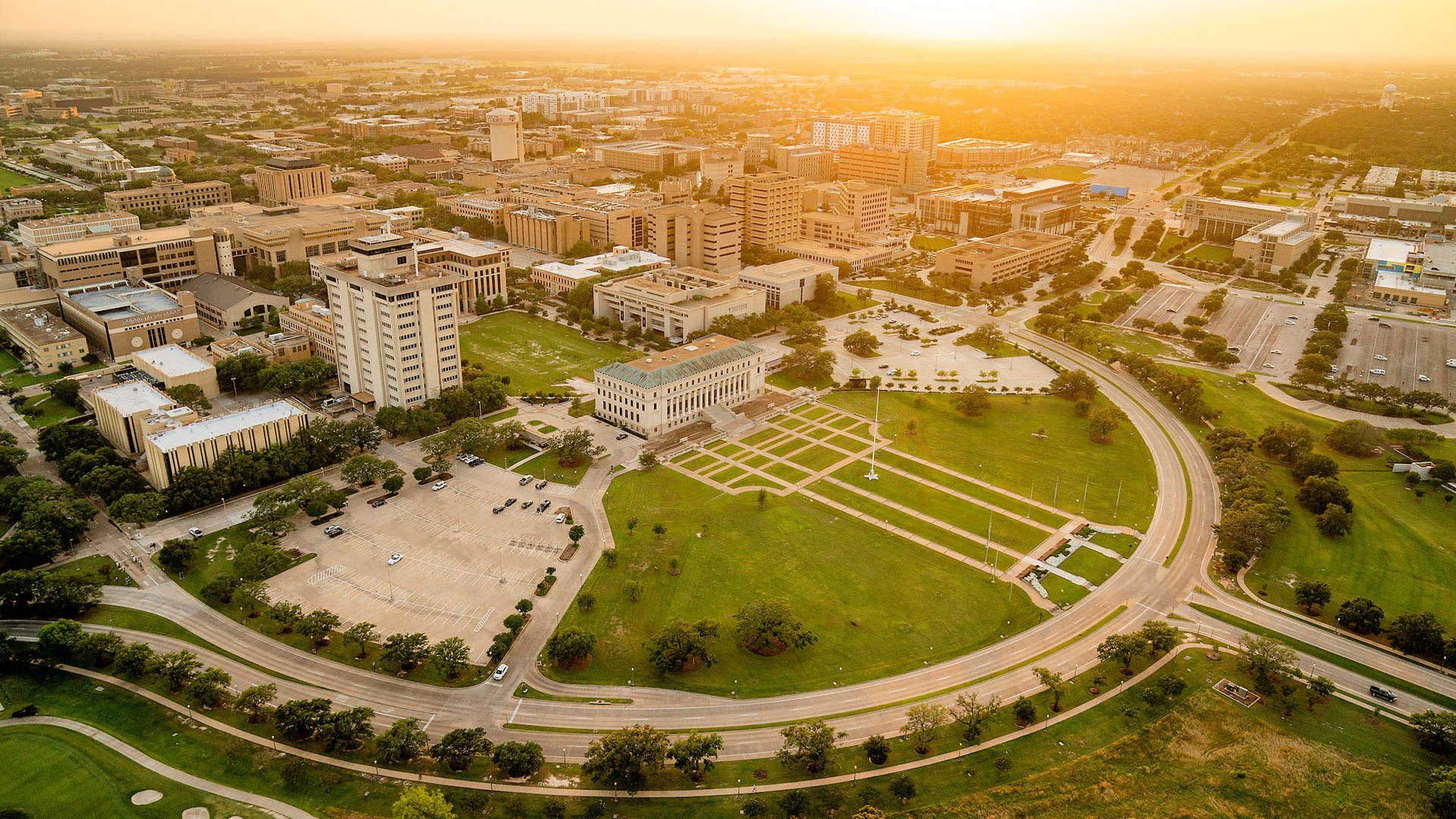 The sun sets over the Texas A&M University skyline 