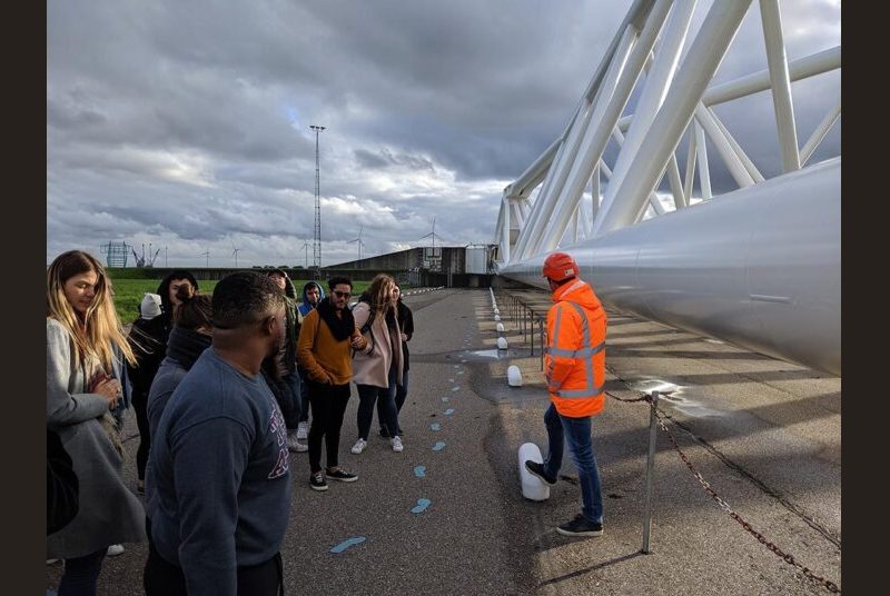 Students visit a wind turbine facility