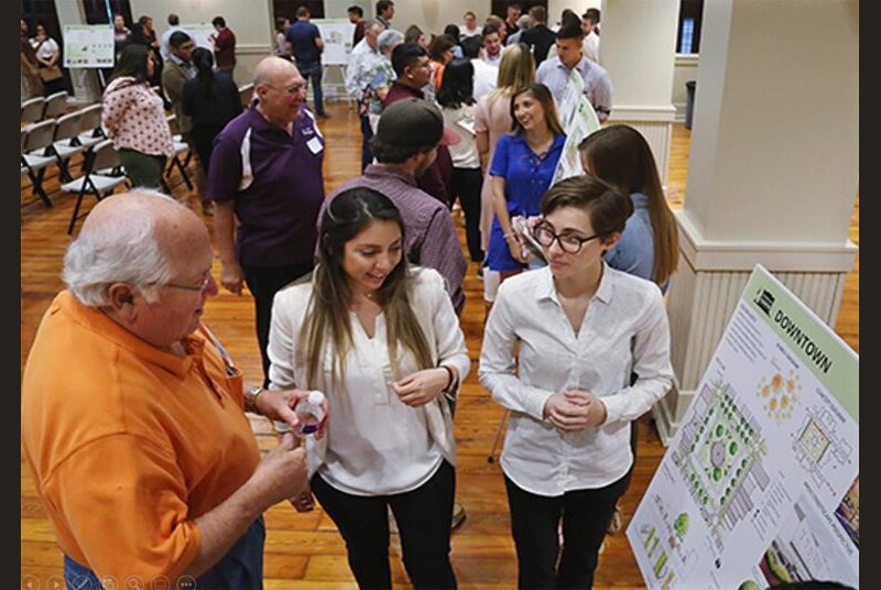 Students and community members discuss ideas to improve the downtown of a Texas Target Community