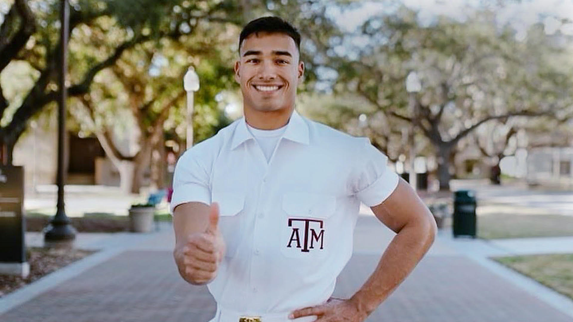 Yell Leader Zac Cross gives the gigs in front of Military Walk