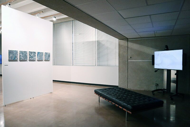 A view of the gallery showing 5 abstract paintings and one video by Beili Liu