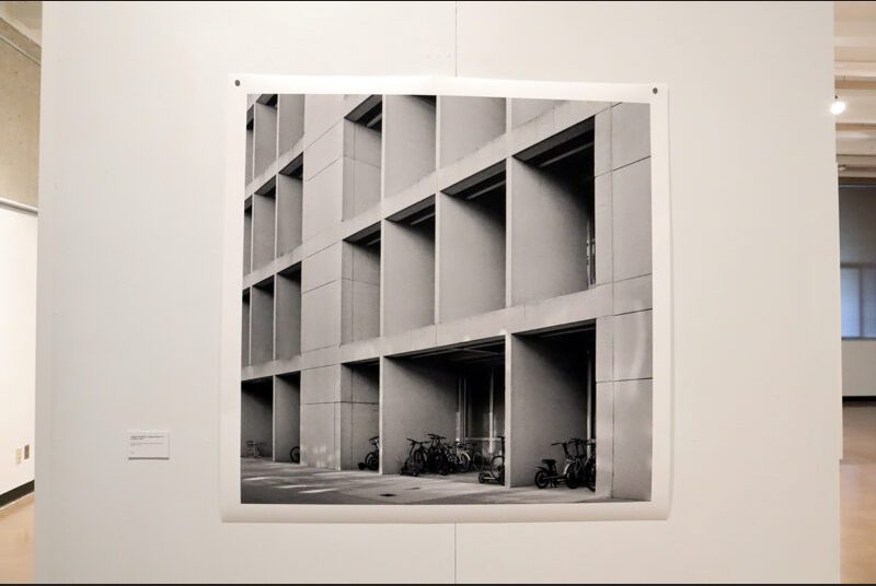 Black and white photo by Leonid Formansky’s of the “Langford Building” on a white wall.