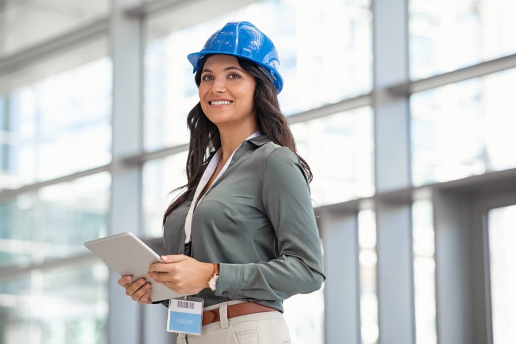 Architect working on digital tablet at construction site