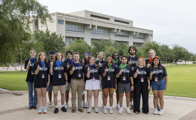 Camp ARCH counselors pose in front of the Langford Architecture complex