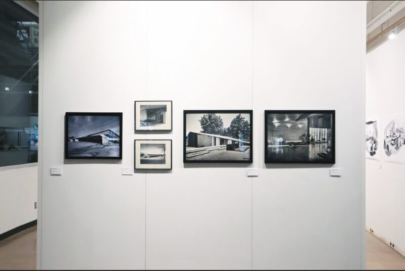 There are 4 black and white photographs of interiors and exteriors and small buildings designed by the architect.