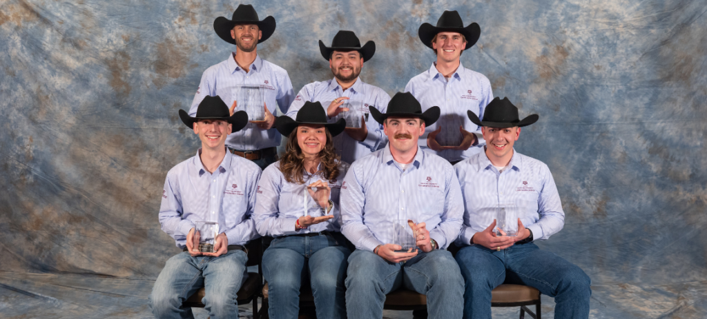 Six recipients holding trophies.