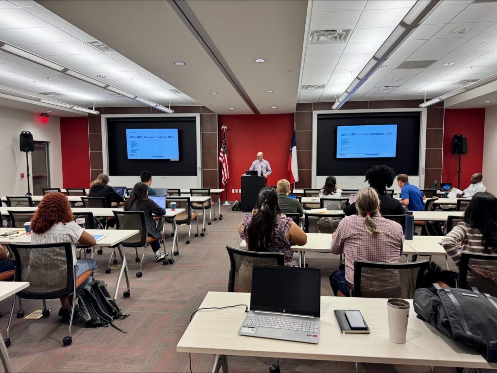 A speaker provides information at the second annual Graduate Student Summer Institute.