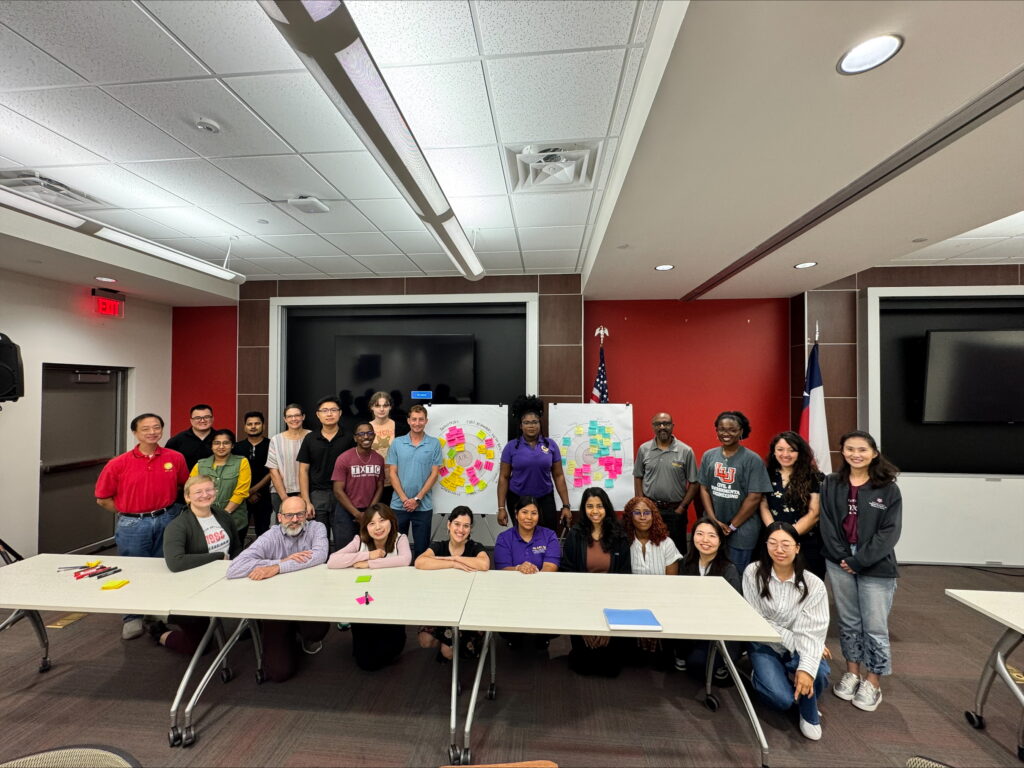 A group of students, faculty and staff at the second annual Graduate Student Summer Institute.