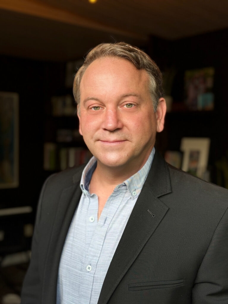 Portrait of Ryan E. Bricker, a 2025 Outstanding Alumnus.
