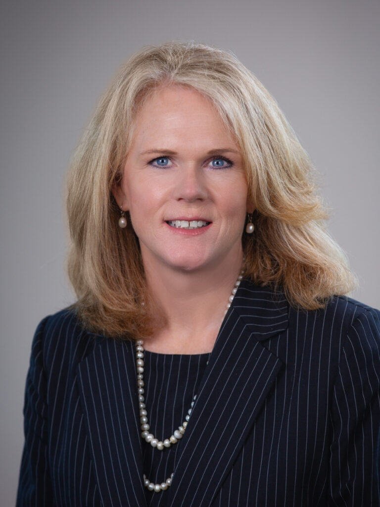 Portrait of Liz Miller Grindstaff, a 2025 Outstanding Alumna.