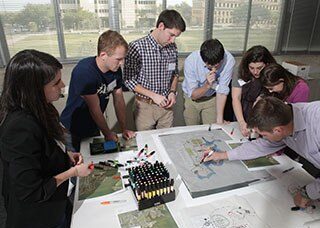 Students work on design plans